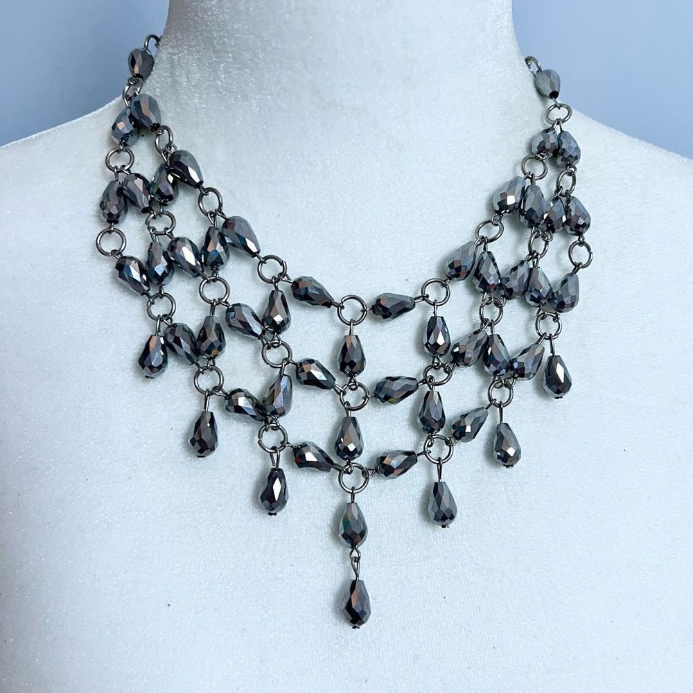 Faceted silver beaded chandelier bib statement necklace
